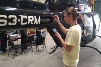 OKOndt Group's specialist is checking the helicopter skin using the portable eddy current flaw detector Eddycon C