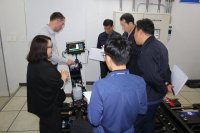 Specialist of OKOndt Group explains to the South Korean Customer the operating principle of the ultrasonic single rail flaw detector