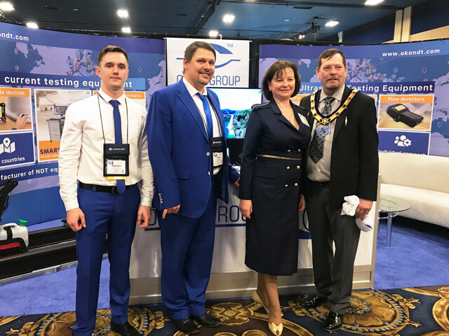 OKOndt GROUP representatives at the company's booth