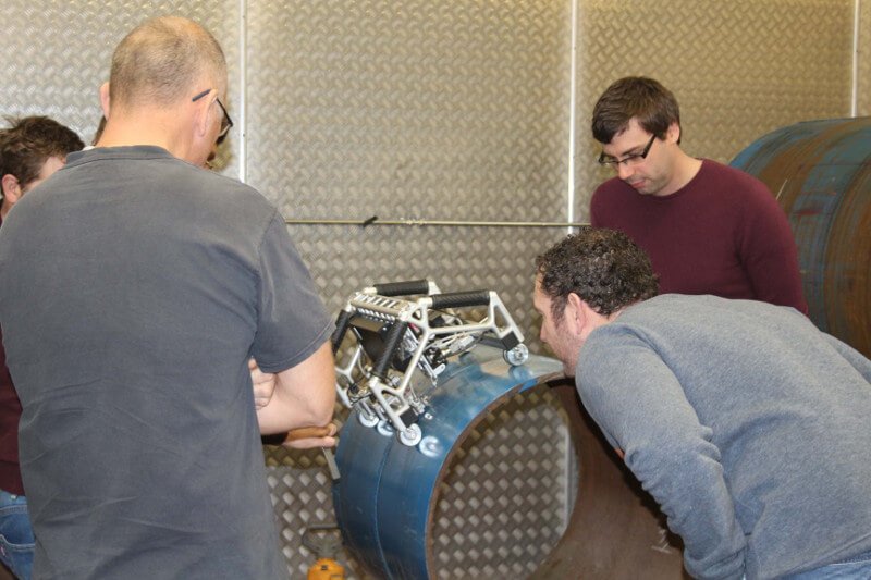 Engineers of Oceaneering International, Inc. are learning the operating principle of the equipment for nondestructive testing of pipeline welds - TOFD-Man system