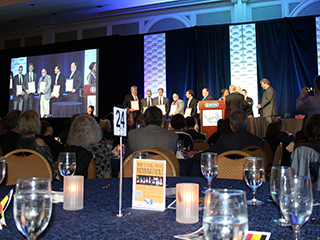 Nominees accept congratulations from the top managers of the American Society for Nondestructive Testing