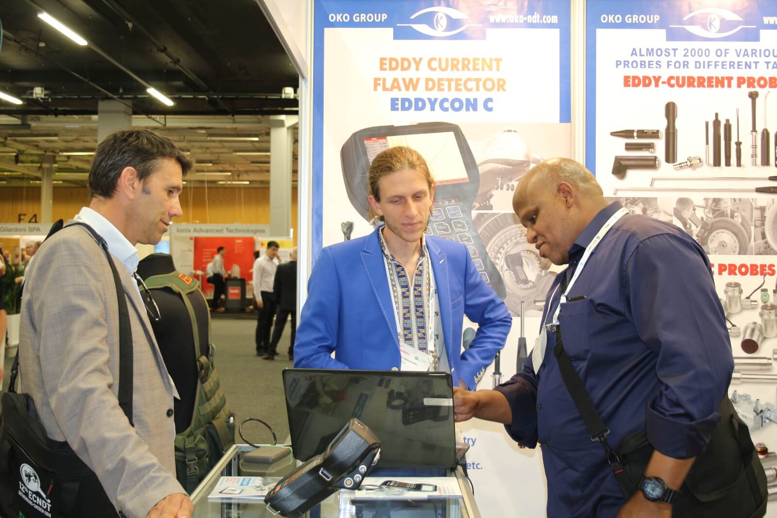 Visitors of the ECNDT-2018 watching presentation of NDT equipment made by OKOndt GROUP