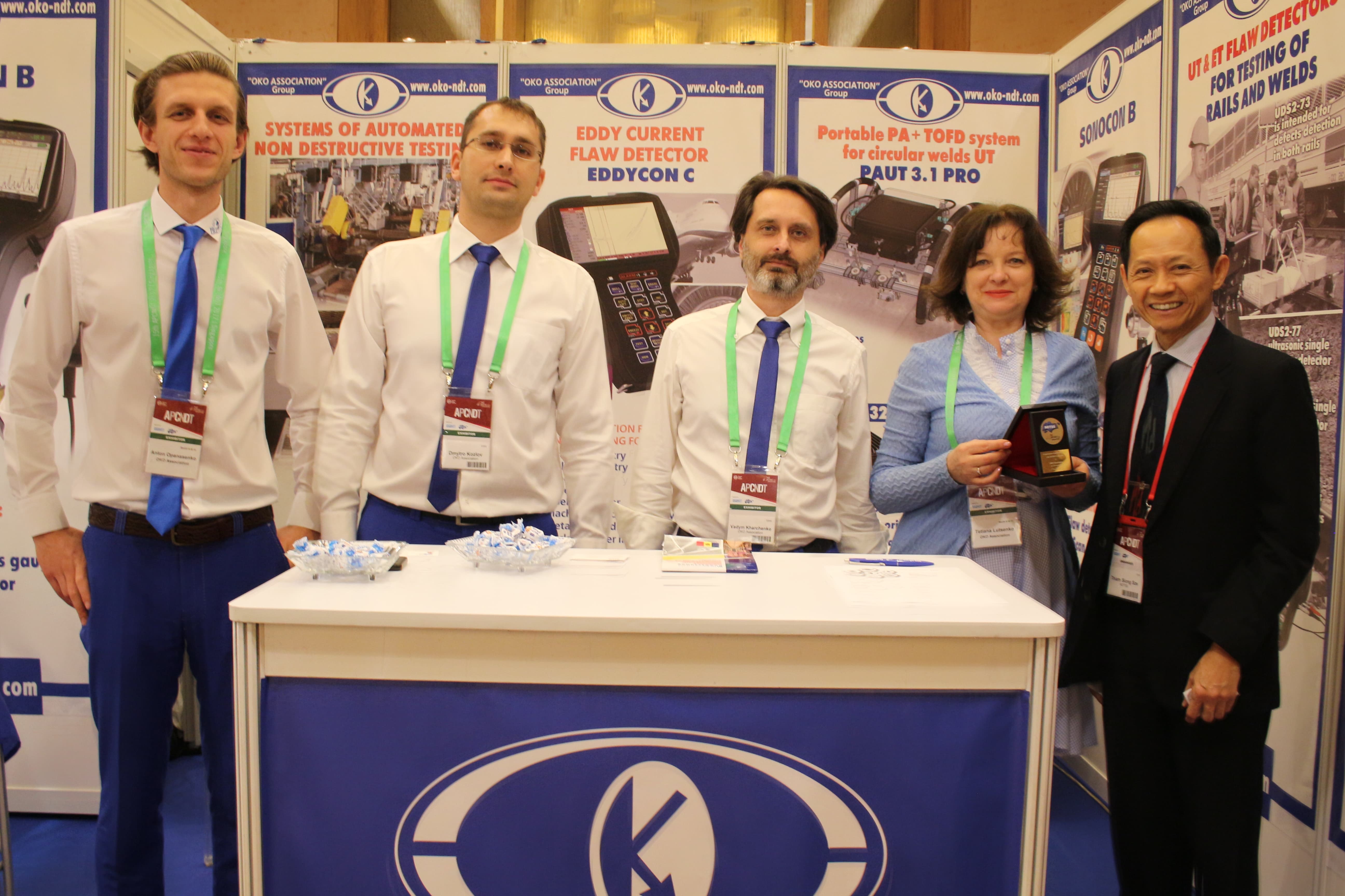 Delegates of OKOndt GROUP represent their booth at the 15th Asia Pacific Conference NDT, Singapore