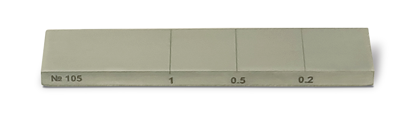 Metal (aluminum) calibration block with notches for eddy current testing, made by OKOndt GROUP